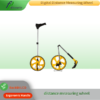 Digital measuring wheel with clear LCD display and ergonomic handle for outdoor distance measurement.