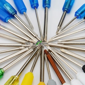 precision screwdriver for small appliances – an image of the mini screwdriver being used to repair a small appliance, highlighting its precision and ease of use.